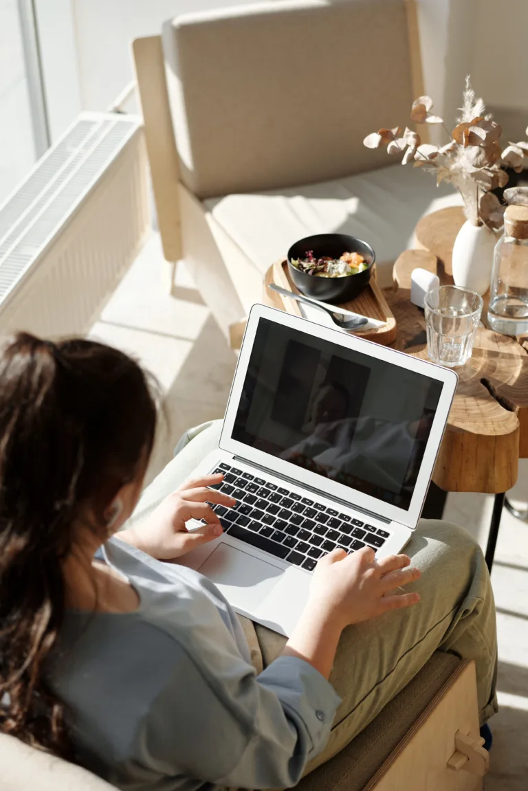 Freelancer working on laptop reviewing accounts with Slough accountant