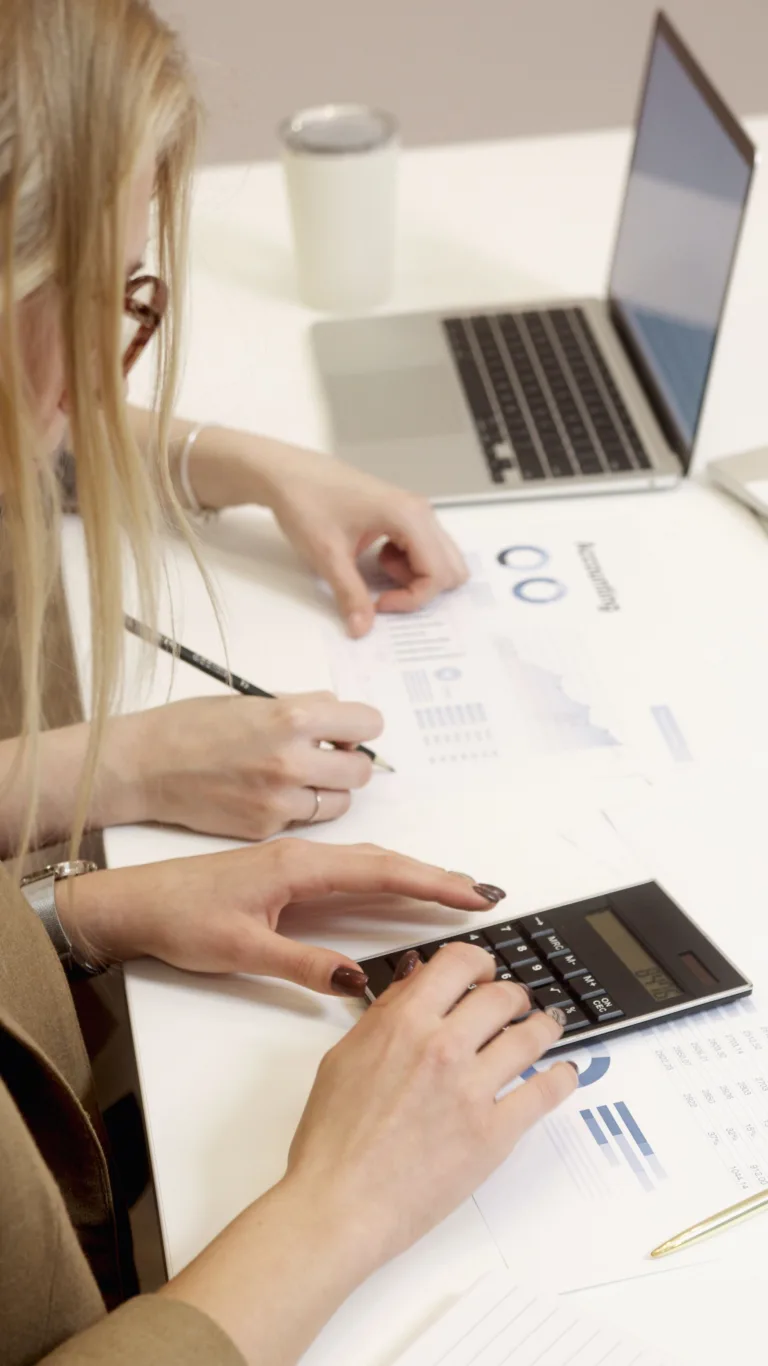 Limited company director reviewing Corporation Tax and payroll figures in Slough