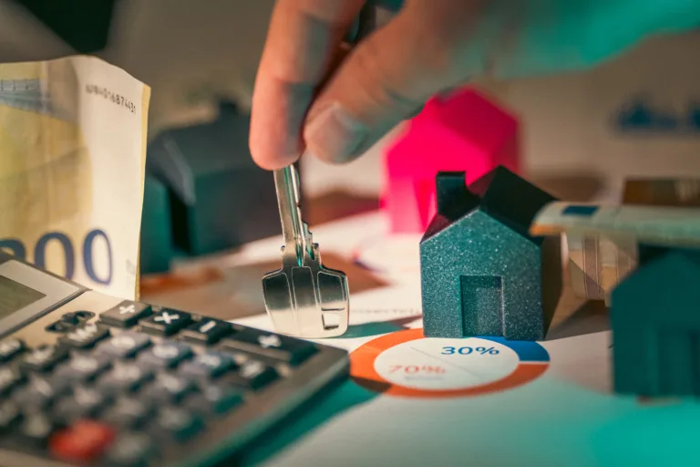 Self-employed business owner reviewing mortgage income documents with accountant