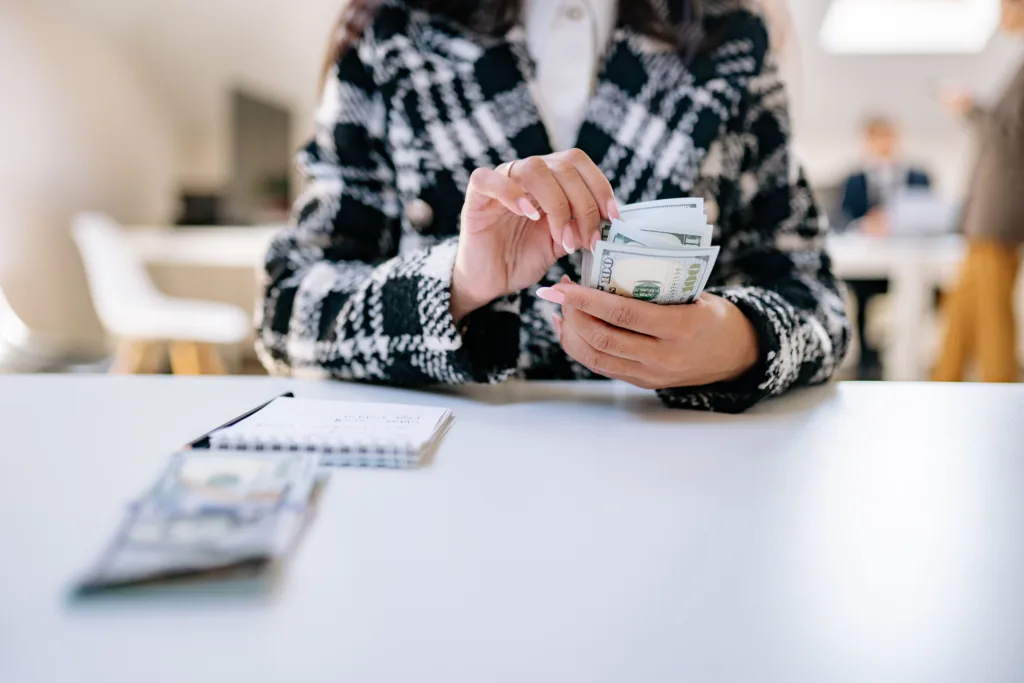 Sole trader reviewing business drawings versus salary on a UK tax return