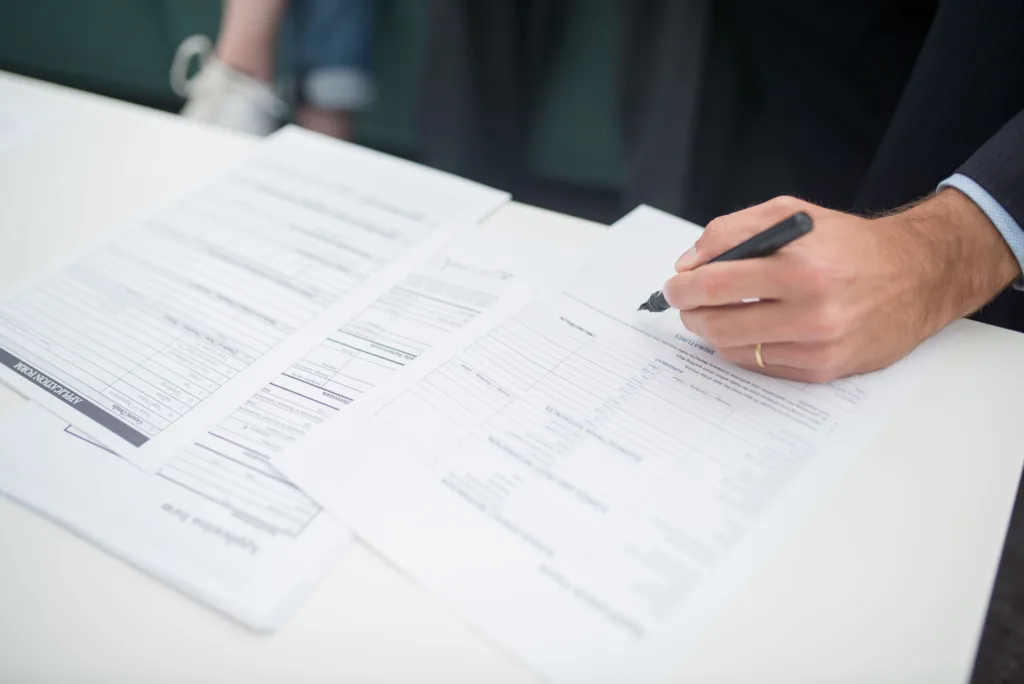 Sole trader registering as self-employed with HMRC on a laptop
