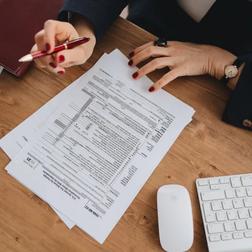 Client signing tax documents with Direct Assist Accountants in Slough