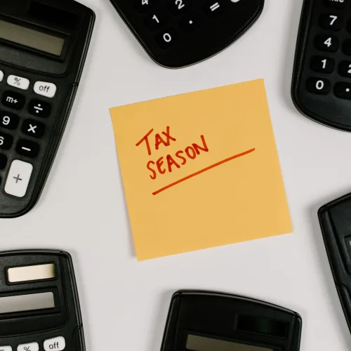 Calculators and tax season reminder note for Slough accounting clients